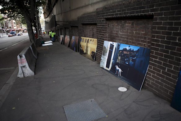 A group of Sydney based photographers have put up 40  photographs along a wall in Elizabeth street.