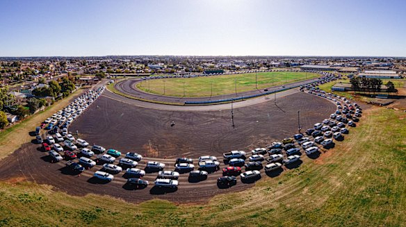 Aerial view of cars queuing for COVID-19 testing at Dubbo Showground.