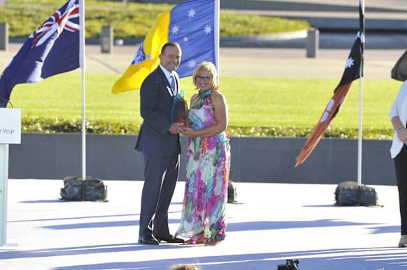 Prime minister Tony Abbott announces the 2015 Australia of the year Rosie Batty on the lawns of Parliament House, Canberra. 
