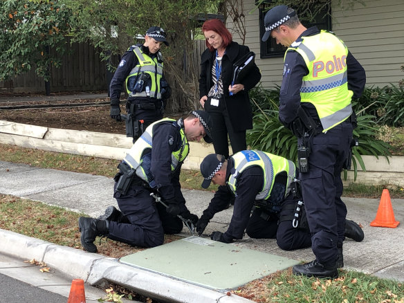 Investigators in Barkly Street, Ringwood after Tuesday's shooting.