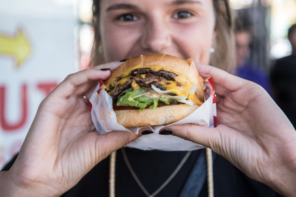 The burger, held here by unofficial burger model Lauren Clements.