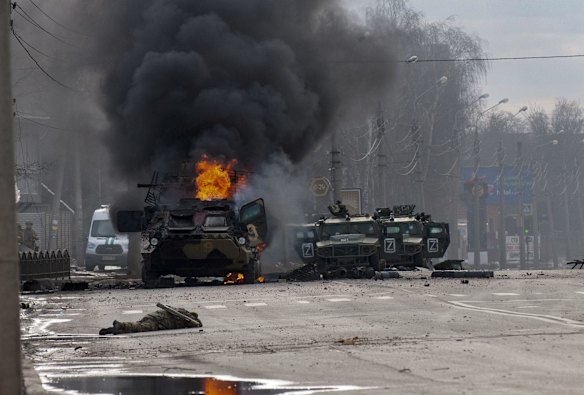 An armoured personnel carrier burns after fighting in Kharkiv, Ukraine's second-largest city, on Sunday.