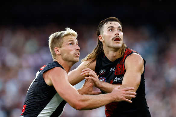 Tough call: The Bombers need to determine whether Sam Draper (right) and Todd Goldstein can work alongside fellow tall Peter Wright in Thursday’s Anzac Day clash.