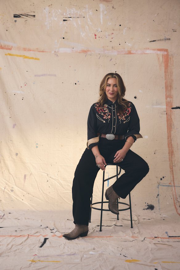 Stylist’s own shirt. Zara jeans. Ella’s own belt. Route 66 boots.