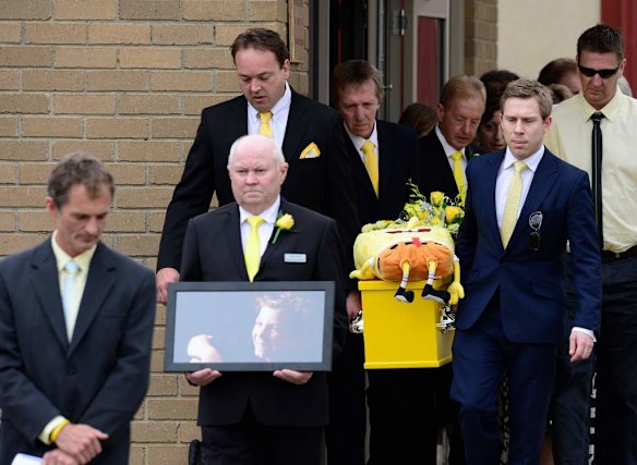 Luke's casket leaves the Chapel.