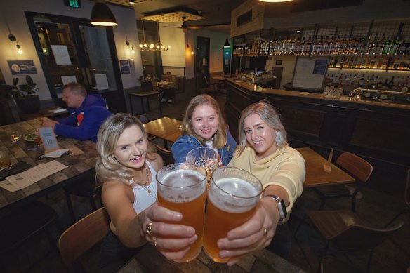 (L-R) Tess Fisher, Carla Snellen  and Steph Parsons  enjoying a a drink at The Local Hotel in Port Melbourne after midnight