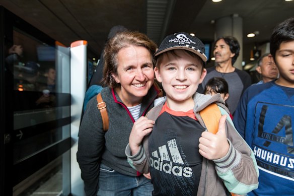  The people first in line to ride the train at Chatswood station, Ryan and his mother Sonya.