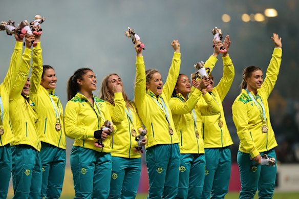 Gold medallists Team Australia celebrate during the Rugby Sevens Women's medal ceremony on day three of the Birmingham 2022 Commonwealth Games at Coventry Stadium. July 31, 2022.