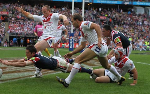 The Roosters Braith Anasta scores a try.