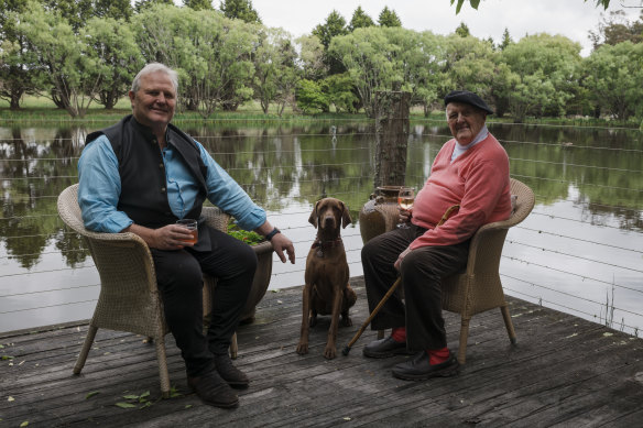 Gallery owner Tim Olsen and his father, artist John Olsen, at John's home and studio in Glenquarry, with dog Duke.