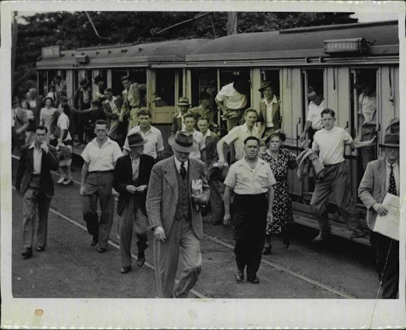 Tow-thirds of the passengers on a crowded Clovelly tram vacated it at the Alison road stop opposite the Randwick saddling paddock, 1950.