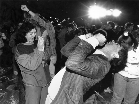 Crowd celebrates at Homebush Bay this morning after the announcement,  24 September 1993.