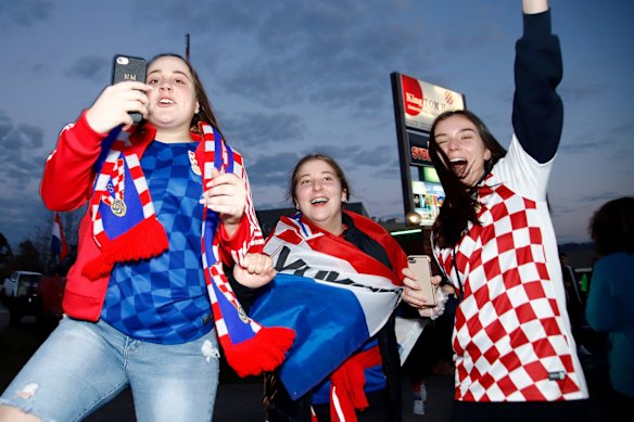 Fans celebrate after the FIFA World Cup semi-final between Croatia and England at King Tom Club in Sydney.
