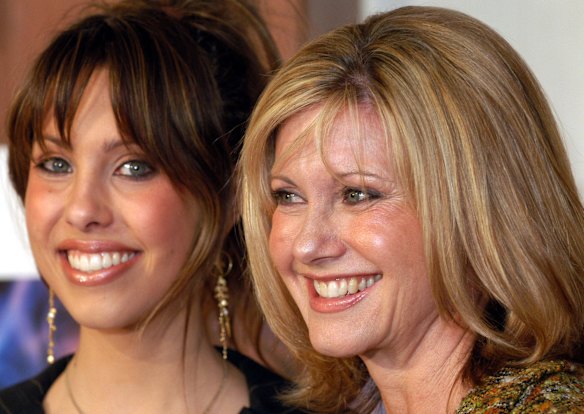 Olivia Newton-John with her daughter Chloe Rose in Tokyo during a four-concert tour across Japan in 2003.  