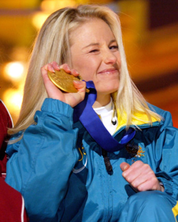 Australia's Alisa Camplin poses on the podium after receiving her gold medal in Salt Lake City.