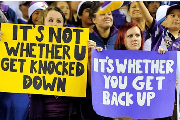 Supporters offer encouragement to Storm players. The team was stripped of their 2007 and 2009 titles, fined $1.6 million and had all the points they have and will earn this season docked.
