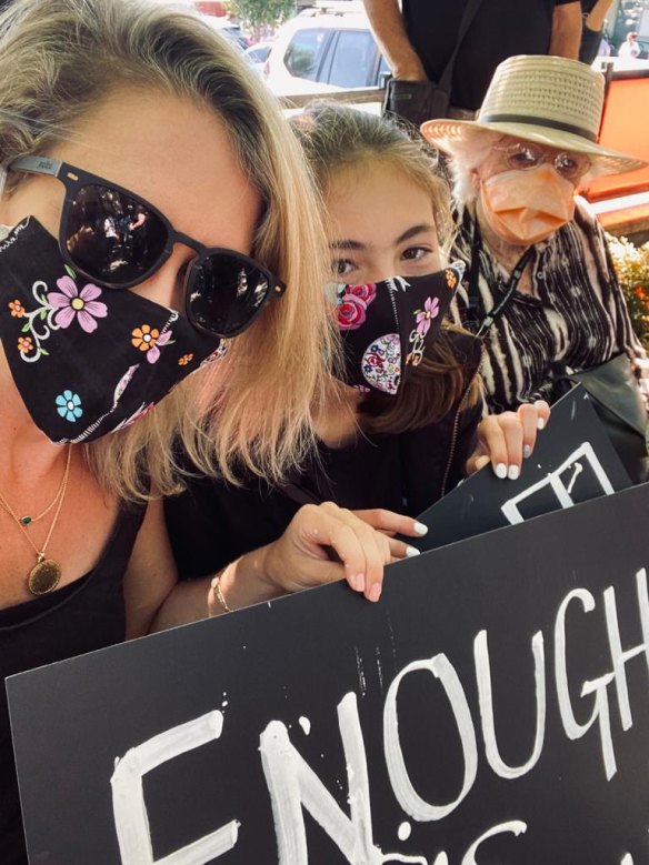 Robinson with sister Matilda and gran Philipa Cracknell, a survivor of abuse, at 2021’s March4Justice.