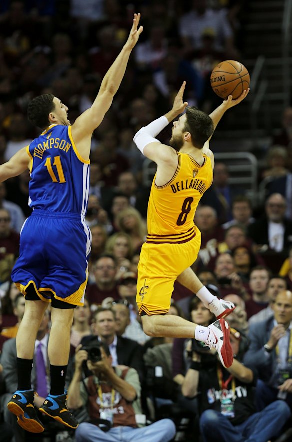 Matthew Dellavedova's game-three starring role: Dellavedova looks to shoot as Klay Thompson tries to block him.