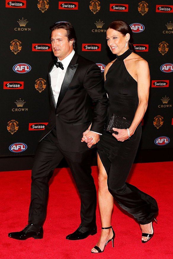 Luke Beveridge, coach of Western Bulldogs and his wife Dana Beveridge arrive ahead of the 2016 Brownlow Medal at Crown Entertainment Complex on September 26, 2016 in Melbourne, Australia.