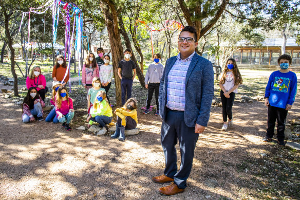 Students at the Austin Jewish Academy with principal Chris Aguero.