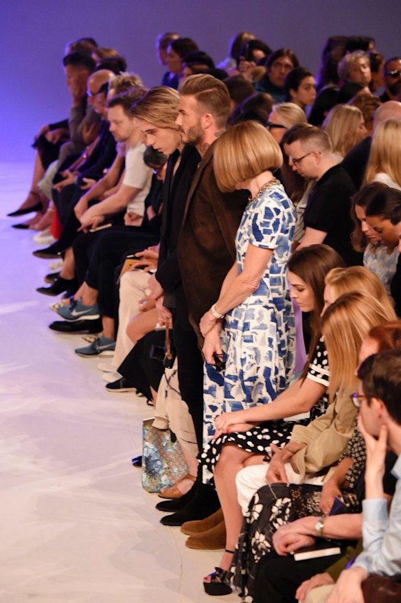 Brooklyn Beckham, David Beckham and Anna Wintour stood to commemorate the 9/11 victims at Victoria Beckham's show.