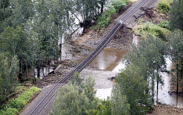 Hunter Valley flooding, showing totally washed out base of the  Northern railway line near Tocal.