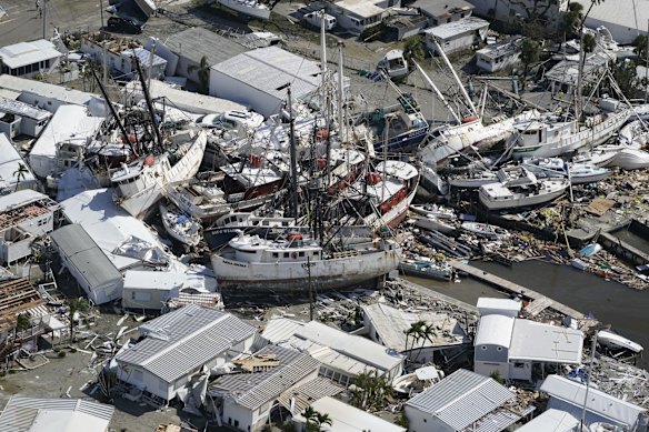 Damaged ships and debris is seen in the aftermath of Hurricane Ian, Thursday, Sept. 29, 2022, in Fort Myers Beach, Fla. (AP Photo/Wilfredo Lee)