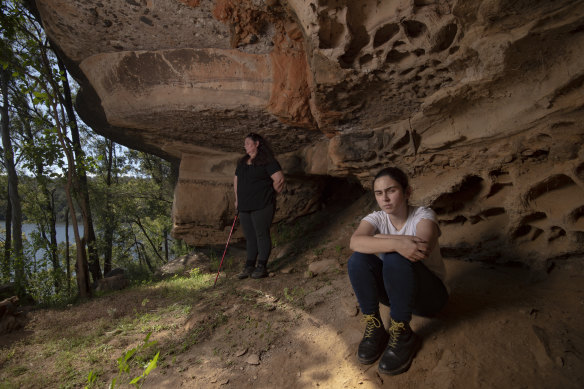 Gundungurra Traditional Owners Taylor Clarke (right) and her mother Kazan Brown visit a cave near the Coxs River, downstream from the junction with the Kowmung.