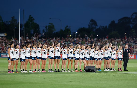Carlton’s AFLW players line up for the pre-game ceremony on Saturday, which included a Welcome to Country speech.