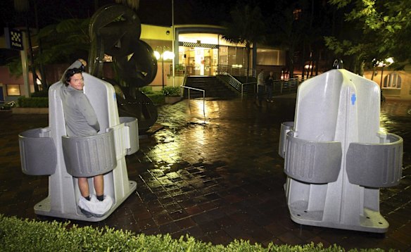 New portable Urinals have been set up in key areas in Sydney. Charles Waterstreet at a urinal located outside Kings Cross Police Station. 15th April 2001.