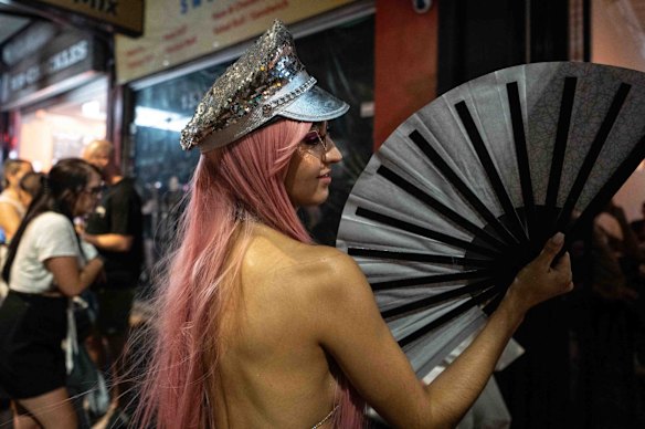 Participants march in the annual Gay and Lesbian Mardi Gras parade at Oxford Street in Sydney .