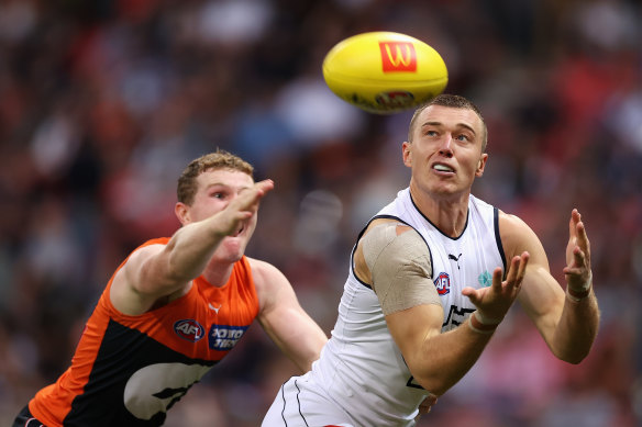 Bullish: The battle between Patrick Cripps and Tom Green will be pivotal in the clash between the Giants and Blues on Saturday.