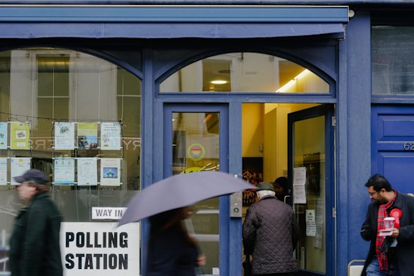 People voting at Marchmont Community Center, London.