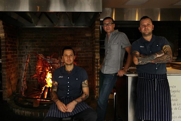Porteno owners Elvis Abrahanowicz (left), Joseph Valore (centre) and Ben Milgete (right) in their restaurant Porteno in Surry Hills, Sydney.
