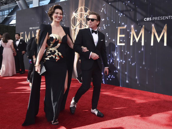 Mary Elizabeth Winstead, left, and Ewan McGregor arrive at the 73rd Primetime Emmy Awards in Los Angeles.