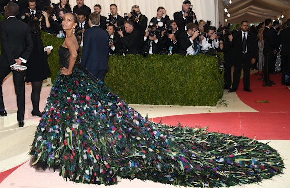 2016: 'Oh, Rihanna's not coming? Make the train twice as long.' Zoe Saldana steals the BOG crown in this walking peacock.