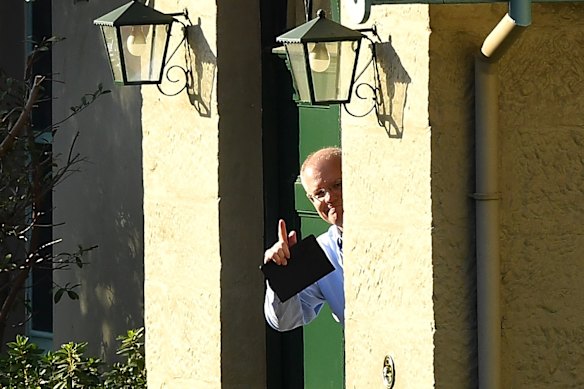 Australian Prime Minister Scott Morrison gestures to media at Kirribilli House in Sydney, Sunday, 19 May, 2019. Approximately 16.5 million Australians have voted the 2019 Election with the Liberal Party retaining Government, with 59.2 per cent of the vote counted, the Coalition appears to have won 74 seats to LaborÃ¢â¬â¢s 66 seats.  (AAP Image/Bianca Di Marchi) NO ARCHIVING
