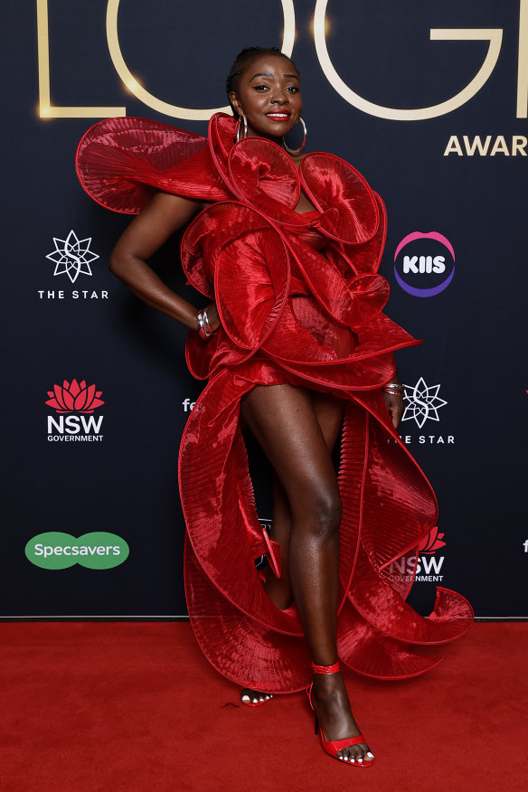 Suzan Mutesi on the Logies red carpet in her striking red gown which was custom-made by an African designer.

 