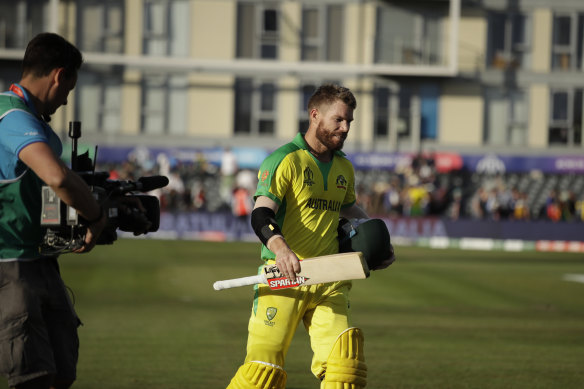 Australia's David Warner leaves the field after the Cricket World Cup match between Afghanistan.