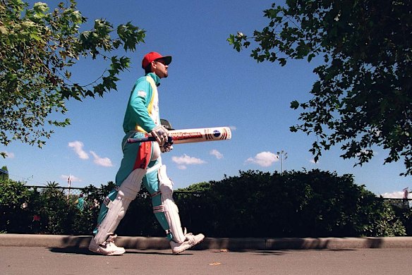 On his way back ... Ponting on his way to practice at the SCG in March 1997. "I've got to get back to first-class cricket, get a truckload of runs and get myself back up to the top of that queue," he said after his demotion.