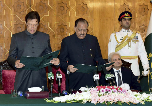 Pakistan's Imran Khan is sworn in as prime minister. 