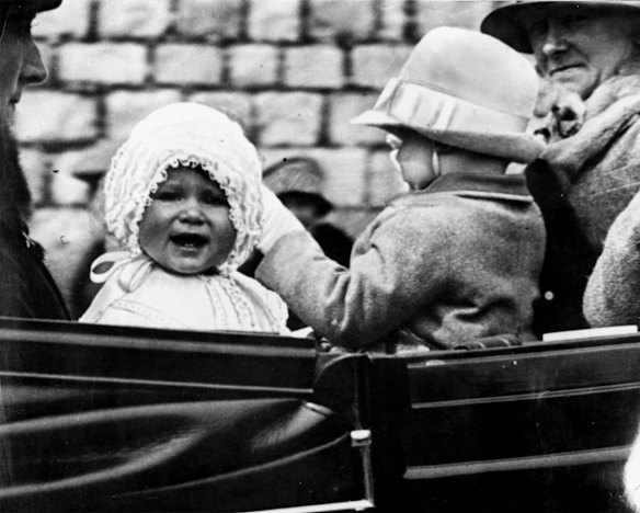 Princess Elizabeth, aged exactly one year, with her cousin, the honourable Gerald Lascelles, son of Princess Royal, at Windsor Castle, 1927.