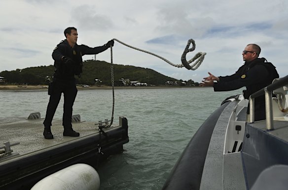 Australian Border Force (ABF) marine tactical officers prepare to moor a fast response boat after patrolling off Thursday Island. The ABF has increased their presence in the Torres Strait as a part of Operation Overarch that was designed to protect the Torres Strait protected zone.