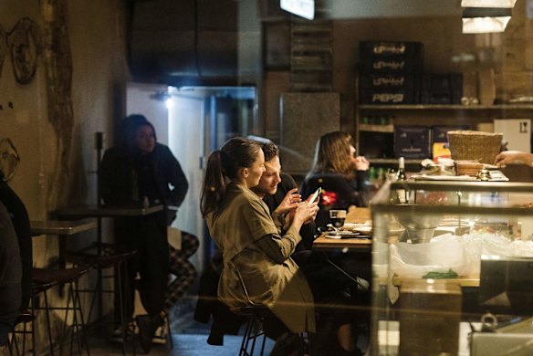 Diners enjoy their first night out after coronavrius restrictions are slightly eased around Sydney to allow people to dine-in, up to a maximum of ten people per restaurant / cafe. 