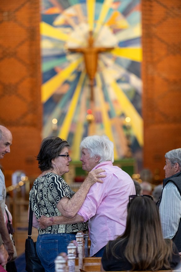 Former MP Cathy McGowan (left) and a churchgoer at the service in Wangaratta.