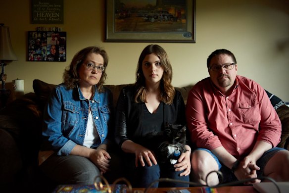 Kristi Schaut (left) with daughter Emile and husband Mark - they lost their daughter and sister Nikki to abdominal cancer and leukaemia.