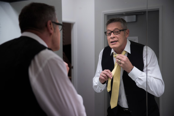 Matt Parkinson adjusts his tie before heading to the studio to stare down his demons.