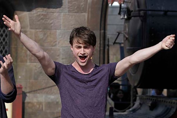 Actor Daniel Radcliffe welcomes guests during grand opening ceremonies of the Wizarding World of Harry Potter at Universal Orlando theme park in Orlando, Florida.