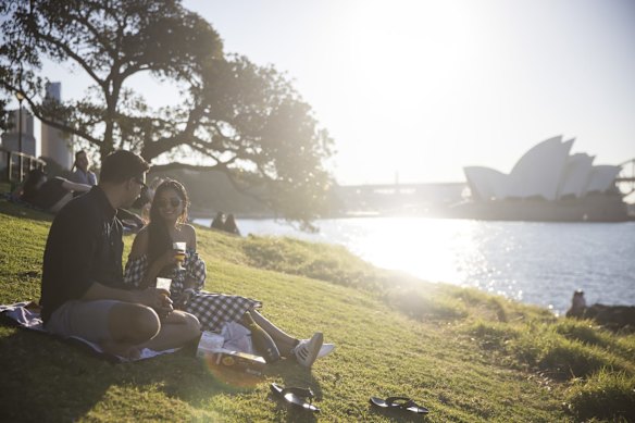People enjoying spring picnics in the Botanic Gardens, Sydney, in the lovely Spring weather during COVID lockdown.