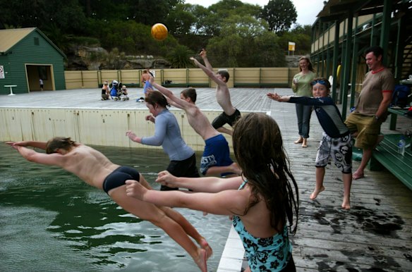 John Neeson and Julia Western supervise six children at Dawn Fraser Pool who were missing school  as part of a national day of action by teachers in 2005. 